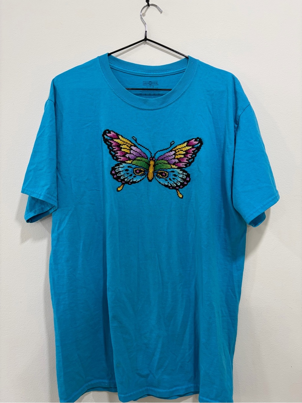 Vintage Turquoise Short-Sleeve Tee with Multicolored Butterfly